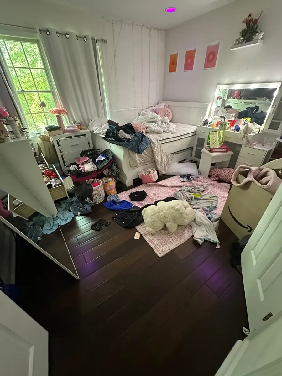 Bedroom: clutter cleared and floors cleaned, before cleaning